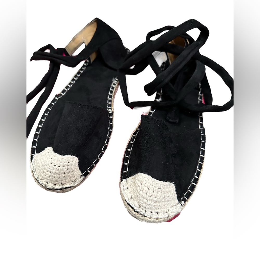No brand listed black lace up shoes approximately size 8.5.